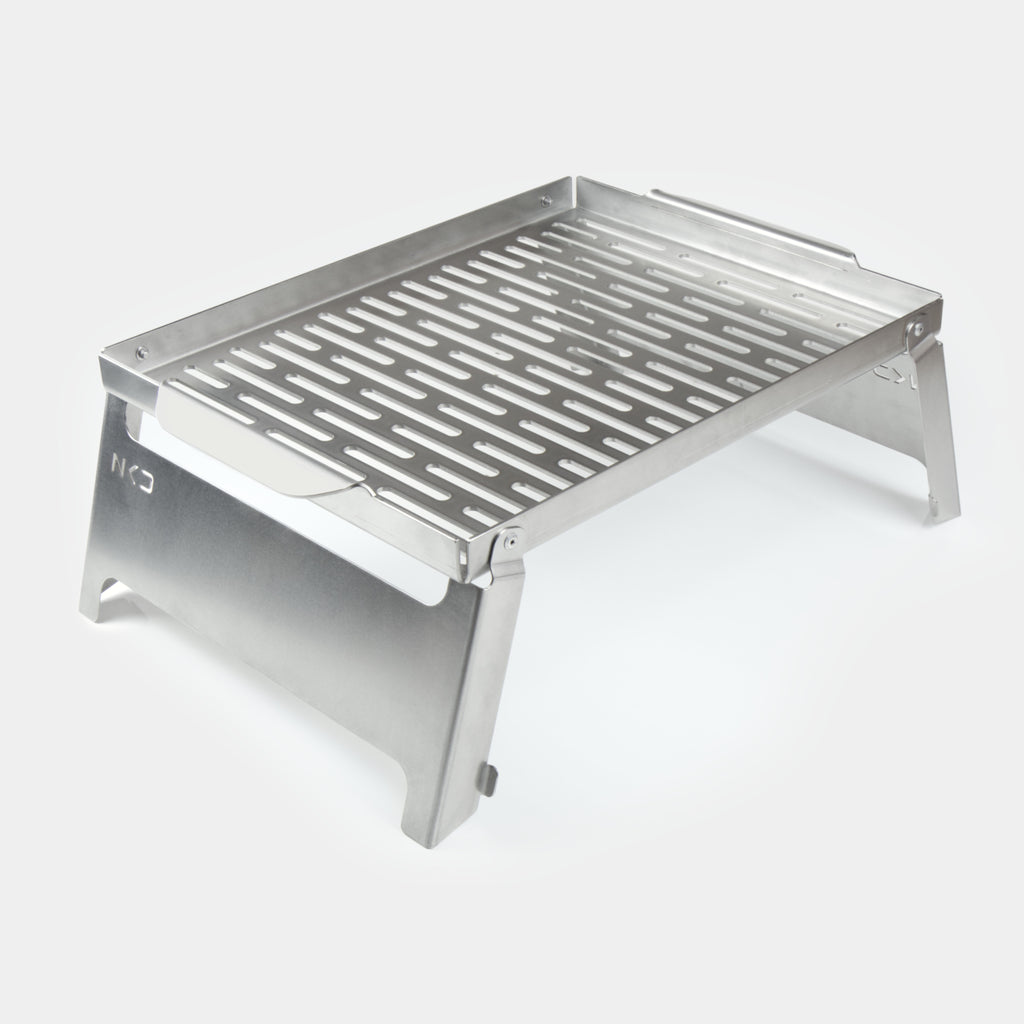 Stainless steel  braai grid on a white background