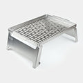Stainless steel  braai grid on a white background