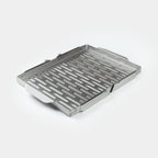 Stainless steel braai grid on a white background